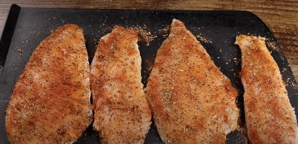 seasoning the chicken 